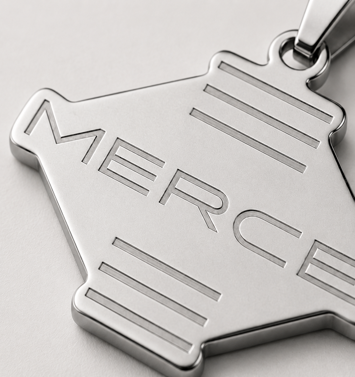 MERCÉ Ligne Pendant lifestyle — silver pendant tabletop still life cinematic