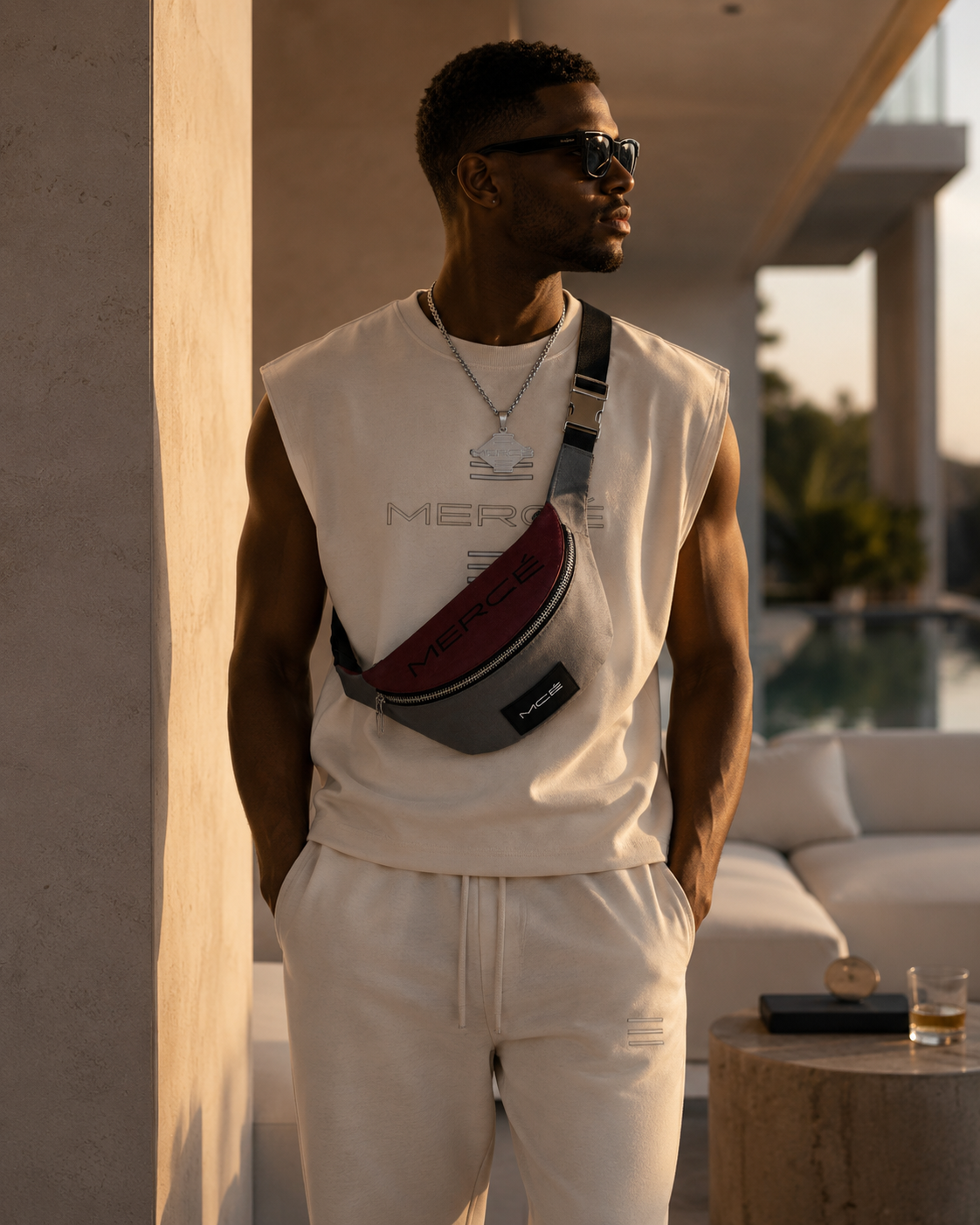 MERCÉ Rouge Sling Pack — luxury sling bag garnet quiet luxury lifestyle editorial