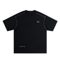 MERCE Atelier Stitch Tee in oversized cotton with contrast stitching