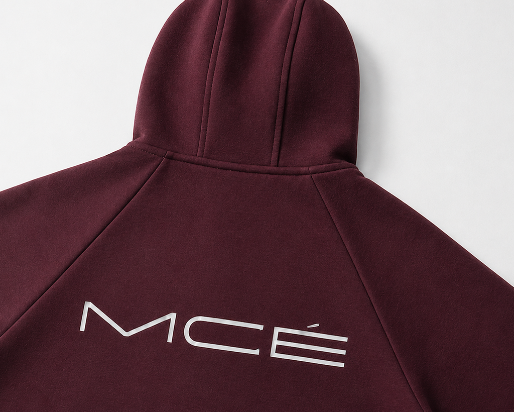 Close-up of MERCÉ heavyweight zip hoodie texture and structured seam detailing